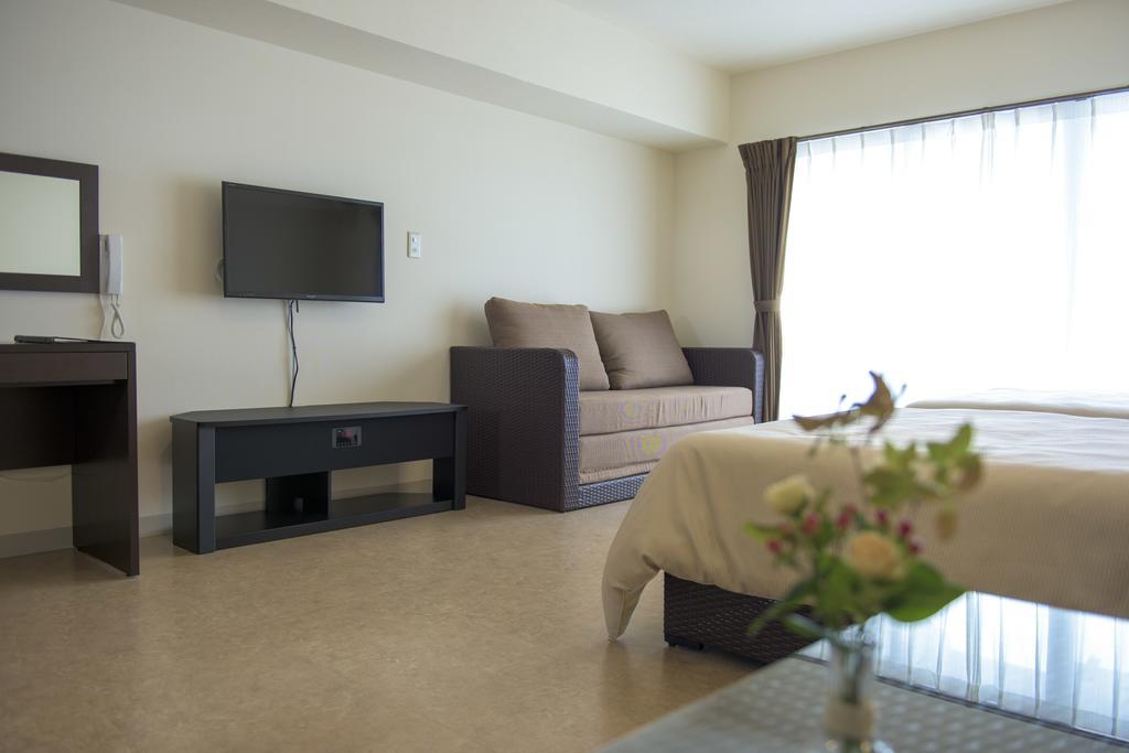 Condominium Hotel Monpa Chatan Bagian luar foto