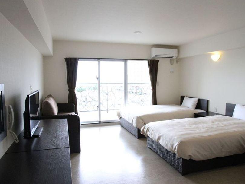 Condominium Hotel Monpa Chatan Bagian luar foto